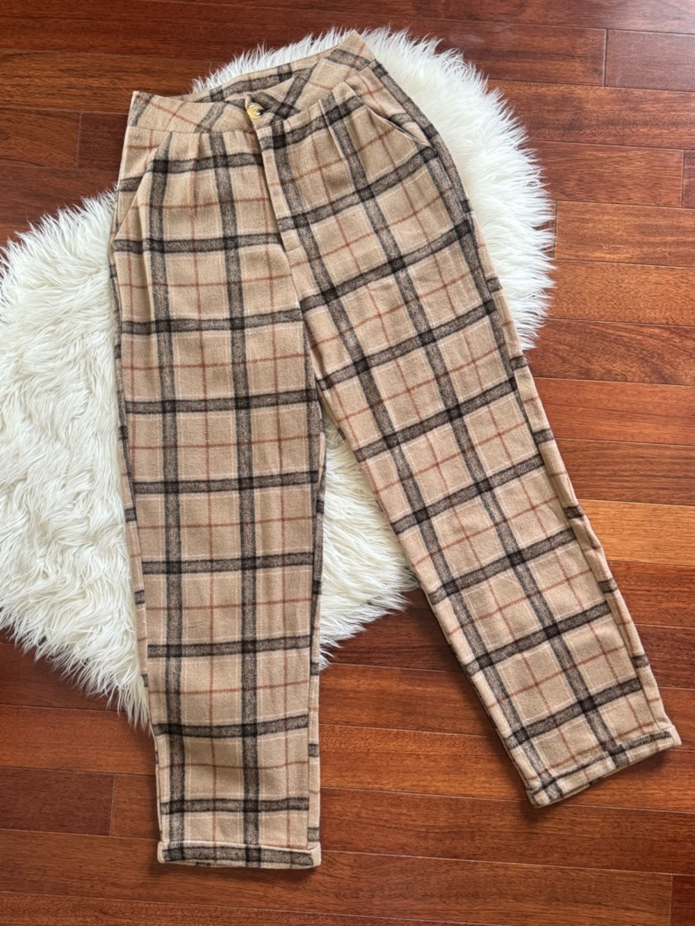 High waisted tan and black plaid cuffed trousers
